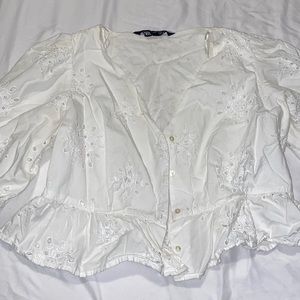 white crop top with floral detail